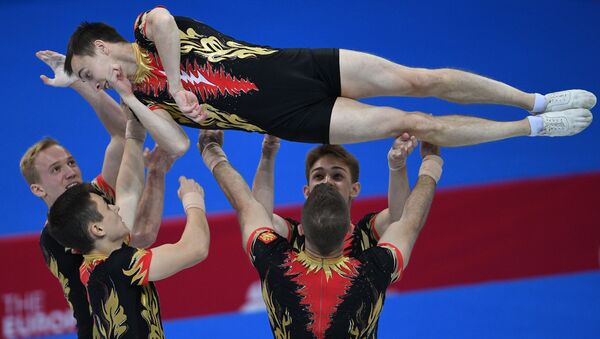 Спортсмены сборной России в командных соревнованиях по спортивной аэробике на II Европейских играх в Минске. - Sputnik Азербайджан
