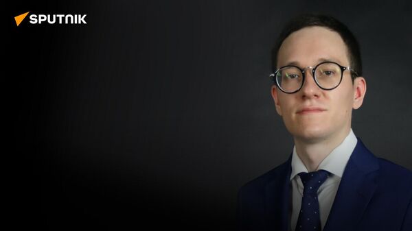 Американист Дудаков: кризис в США заставит американцев снизить активность на мировой арене - Sputnik Азербайджан
